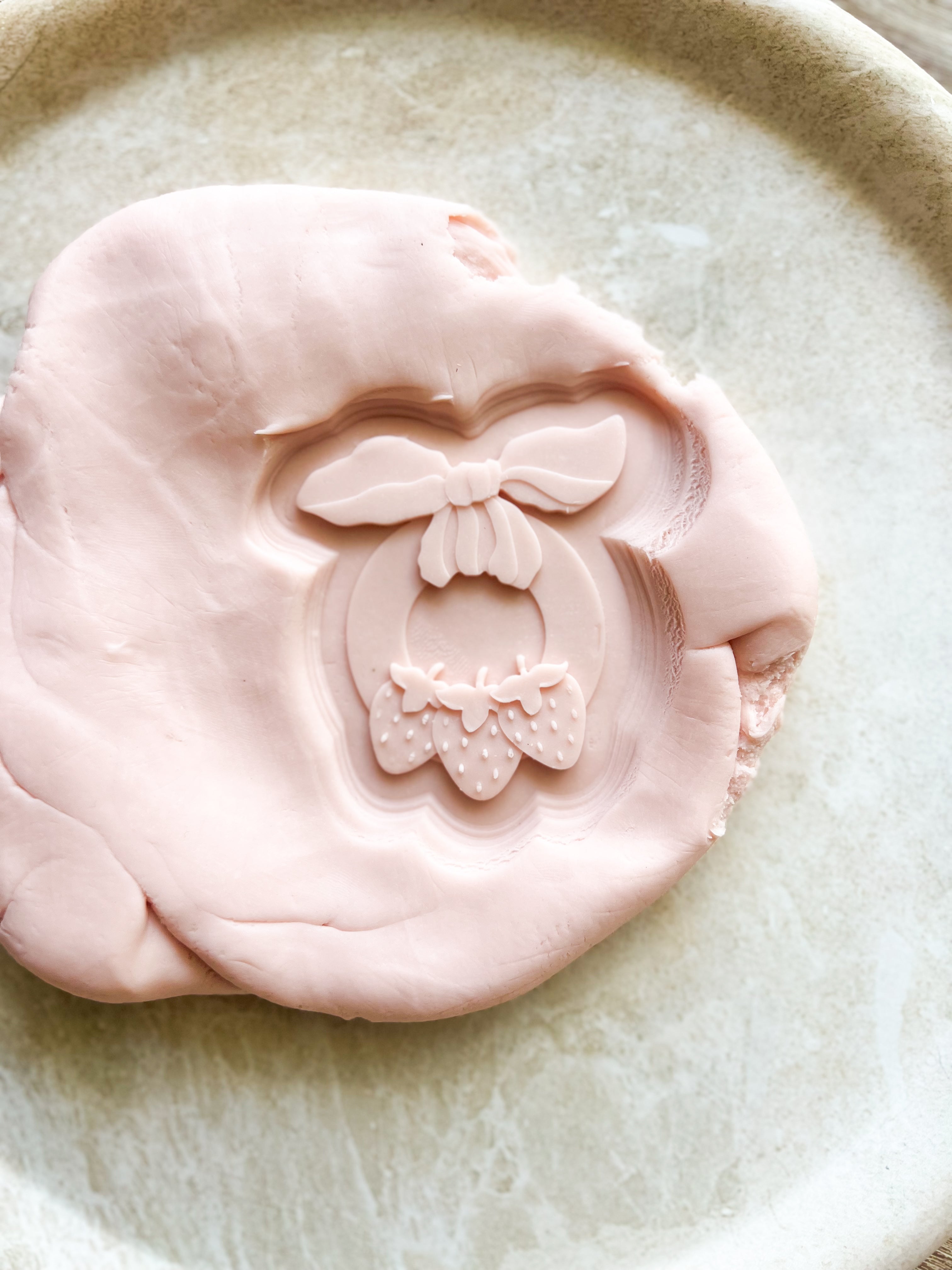 Strawberry baby teether debosser and cutter