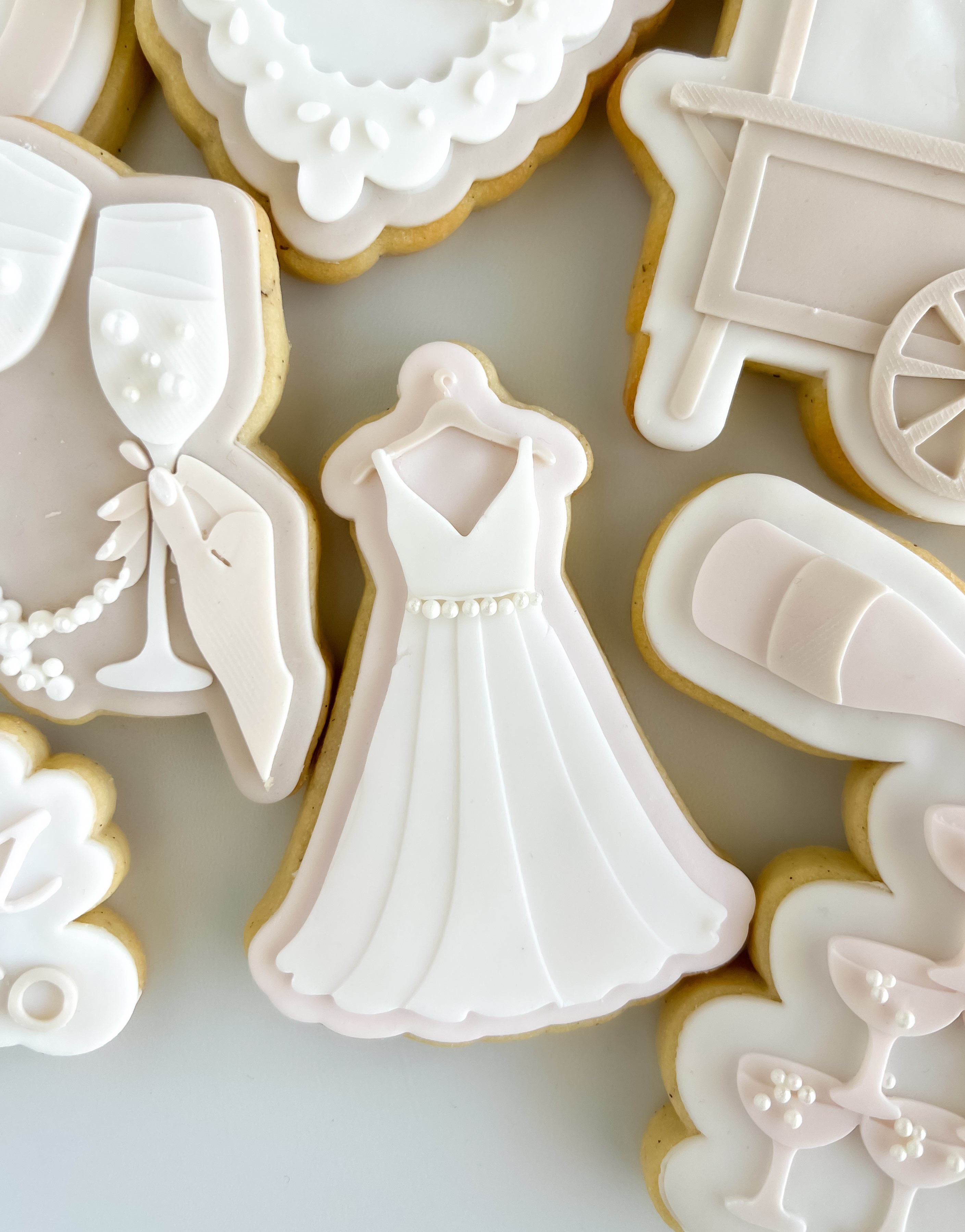 Bride dress on coat hanger debosser and cutter