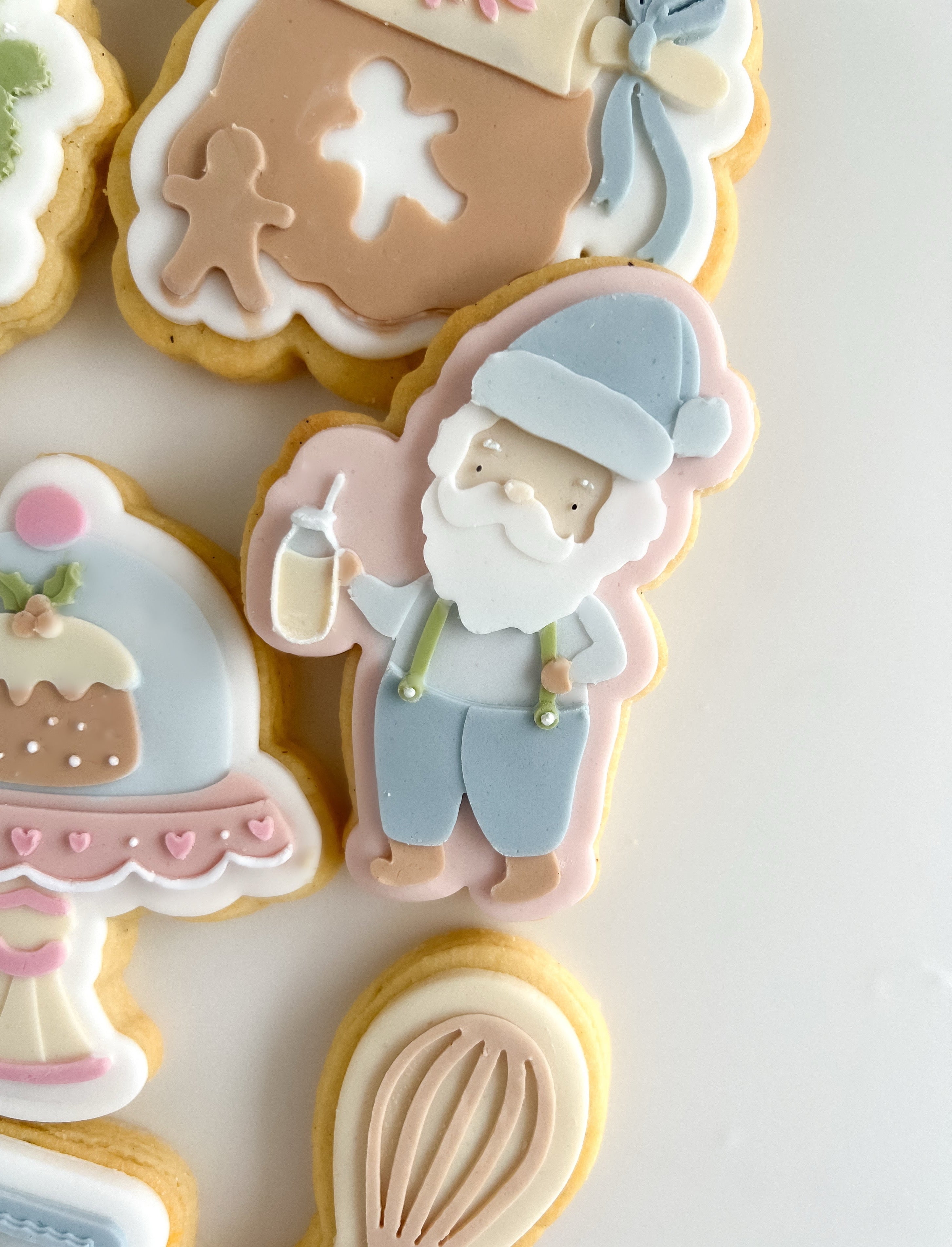 Santa holding milk jar debosser and cutter