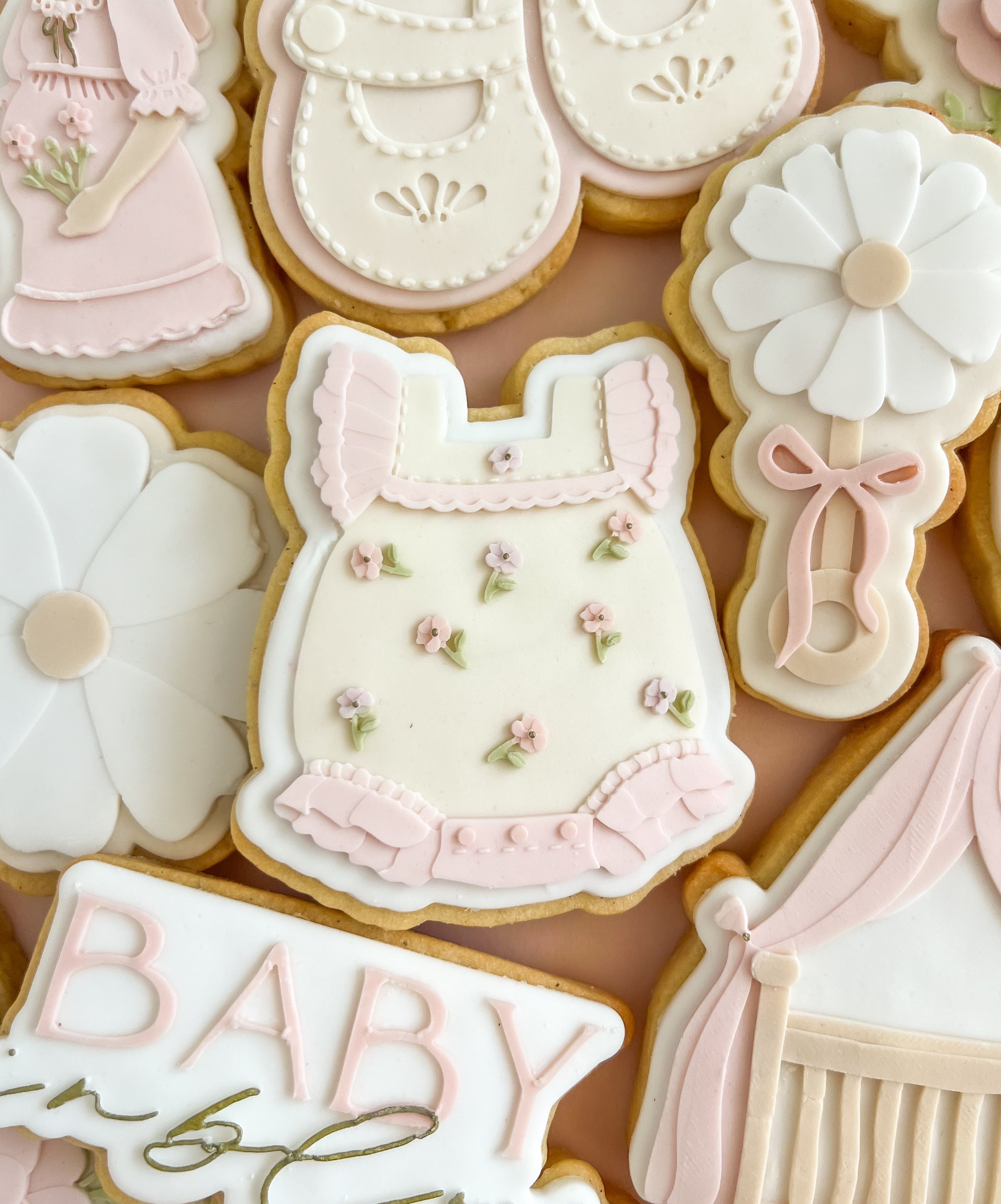 Floral baby onesie debosser and cutter