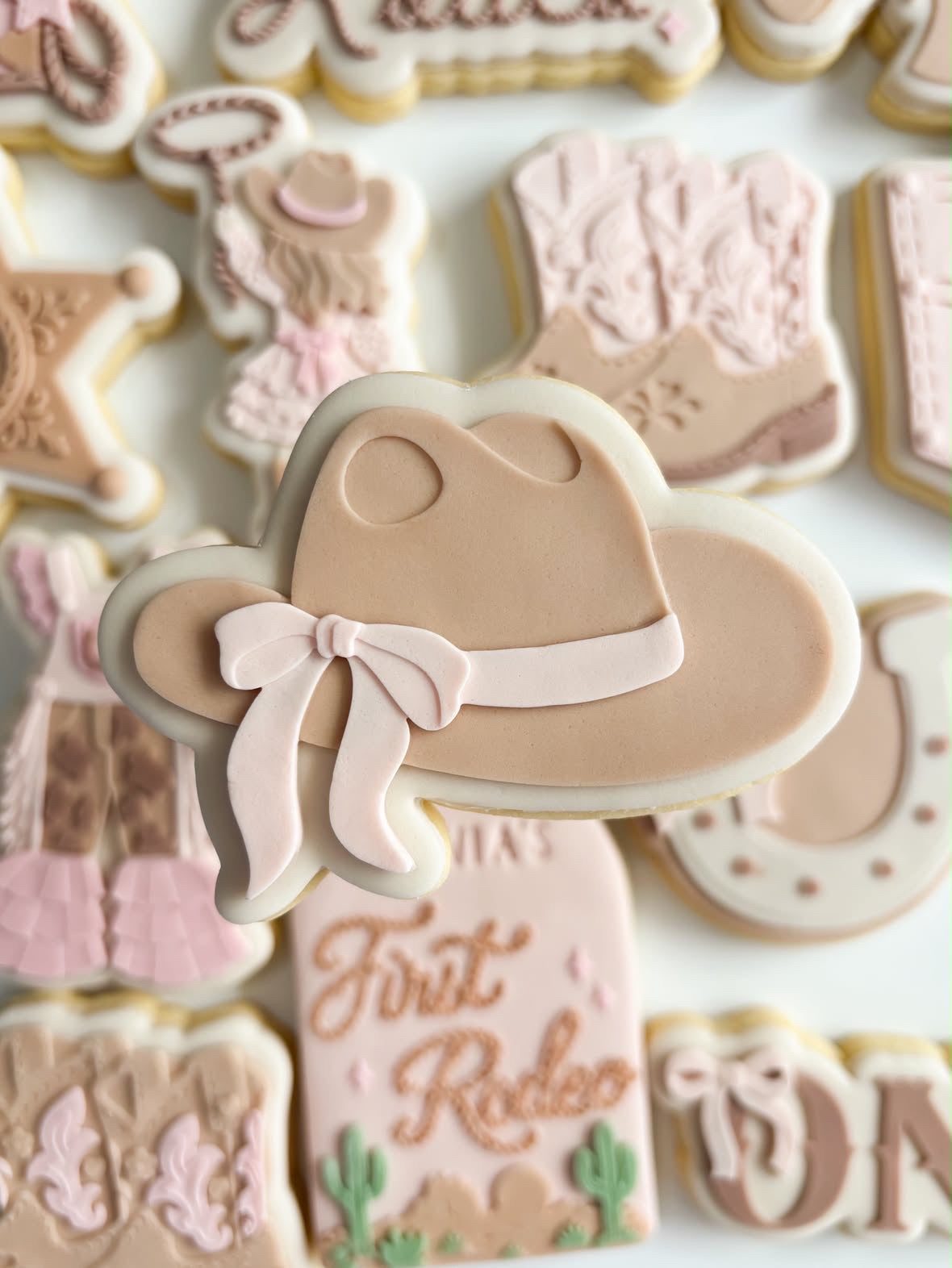 Cowgirl hat with bow debosser and cutter