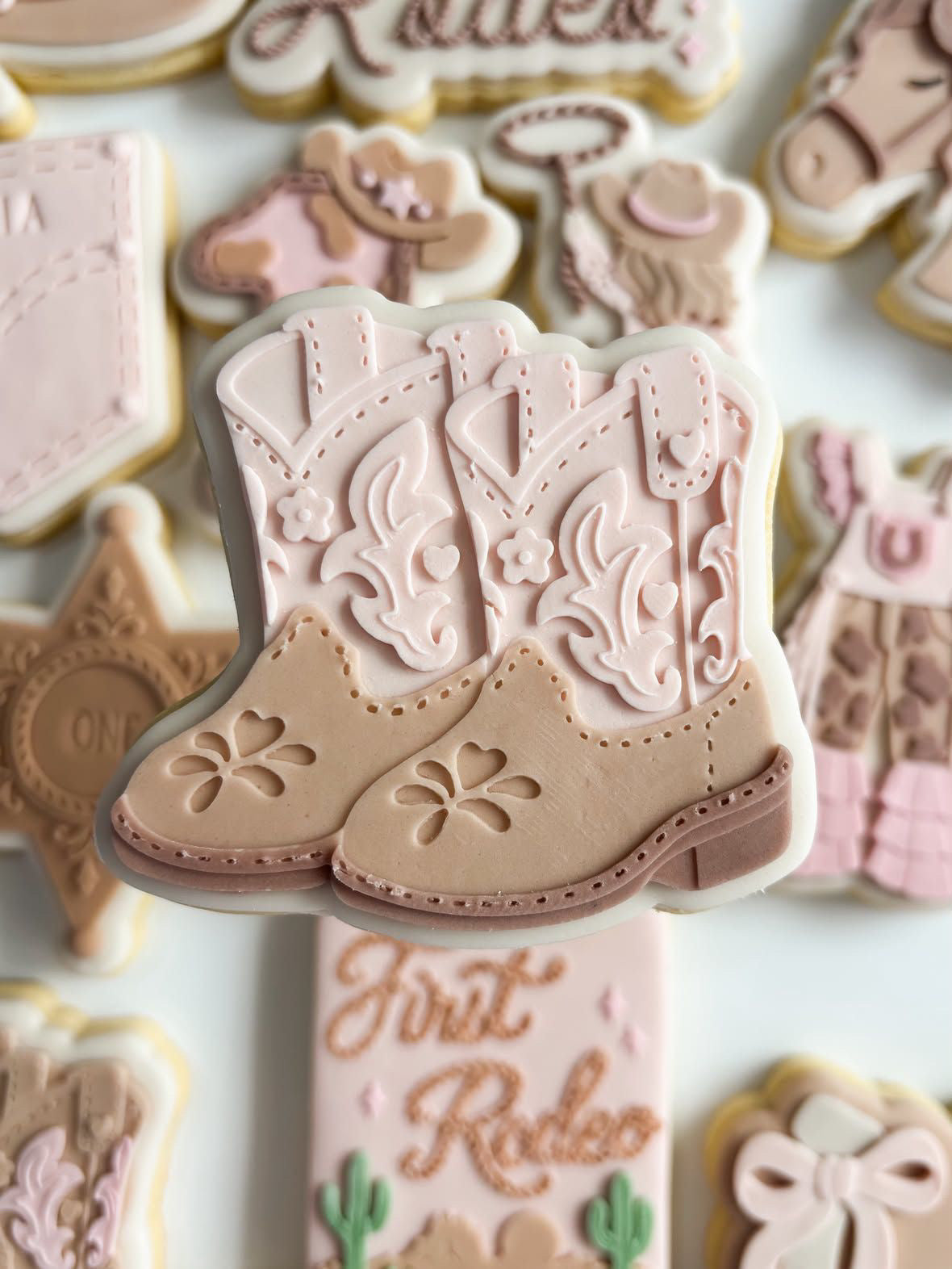 Cowgirl boots debosser and cutter
