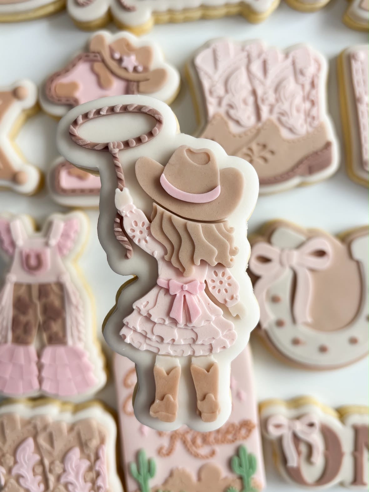 Cowgirl with lasso debosser and cutter