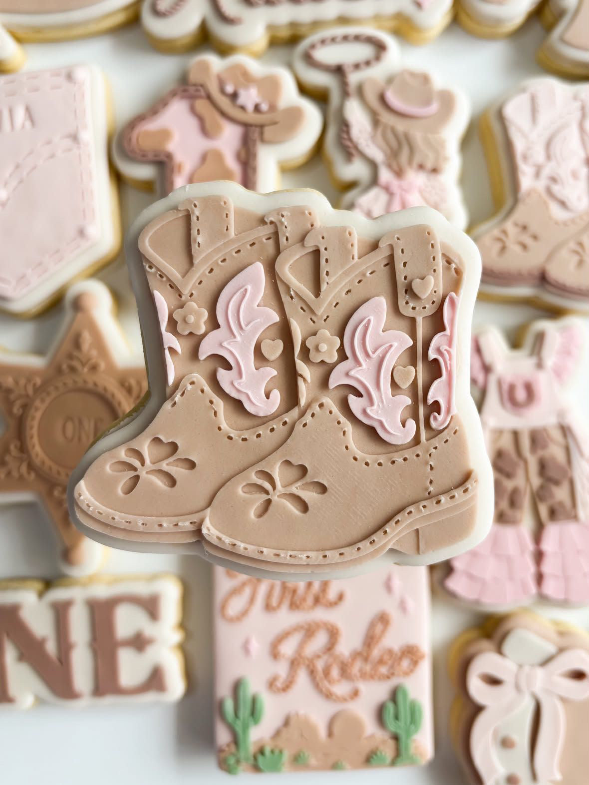 Cowgirl boots debosser and cutter